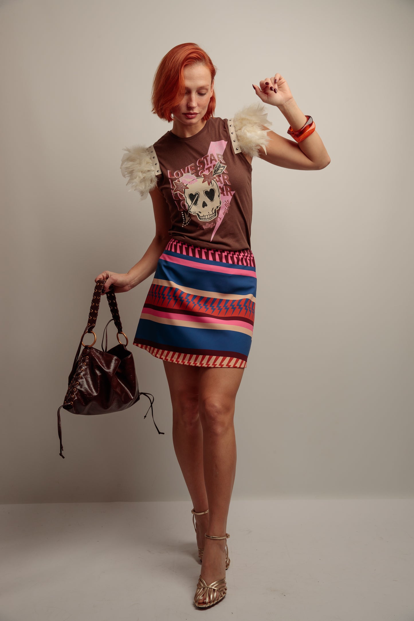 Camiseta Plumas Tachas SK Caye