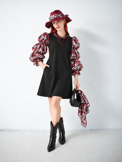 Robe noire froncée