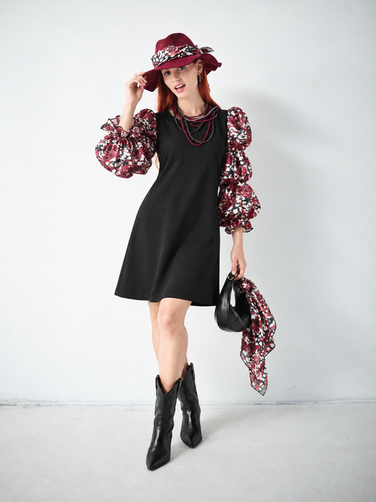 Robe noire froncée