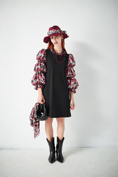 Robe noire froncée
