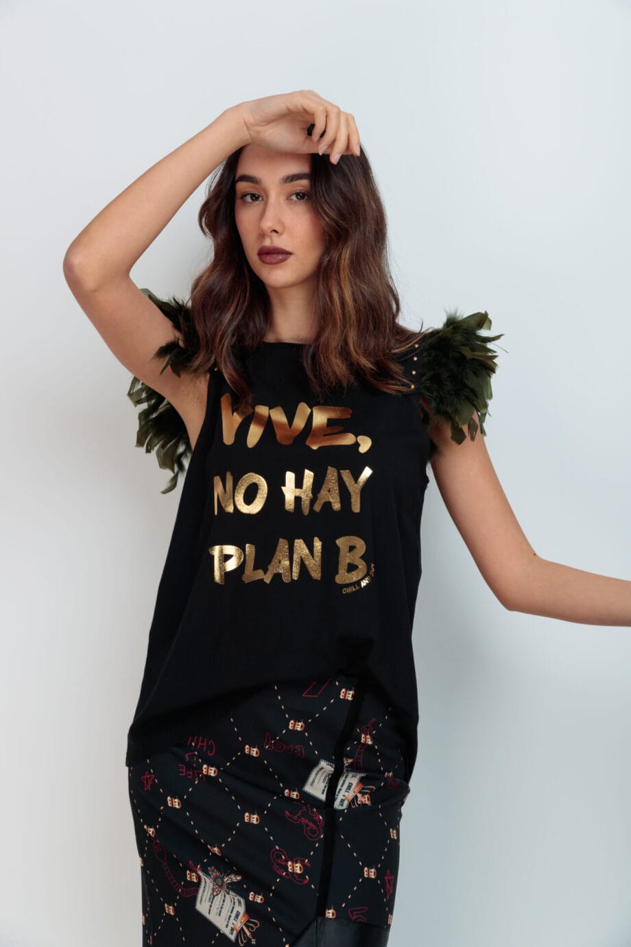 camiseta plumas plan b