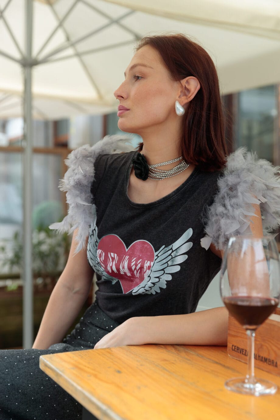 CAMISETA PLUMAS ALAS BRAVE