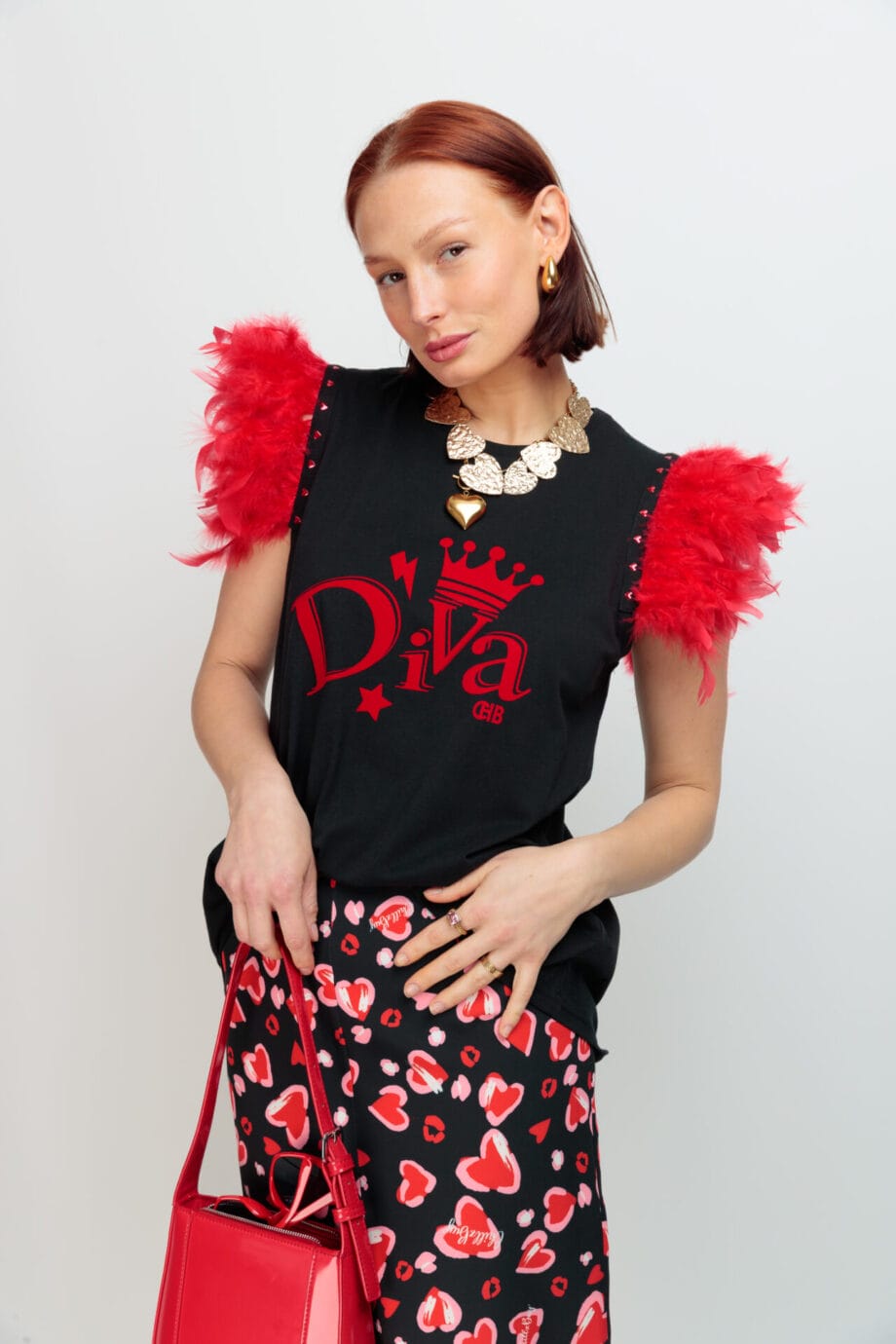 CAMISETA PLUMAS TACHAS DIVA