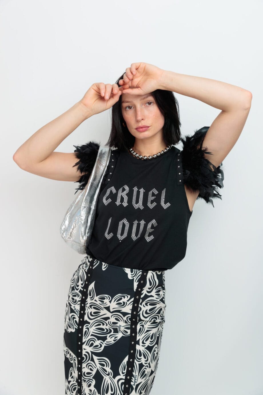 CAMISETA PLUMASTACHAS CRUEL LOVE